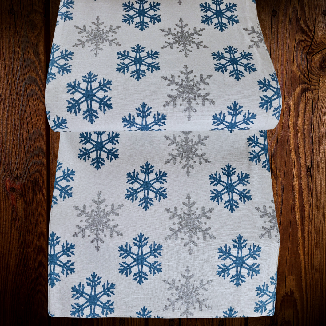 Copos de Nieve. Camino de mesa blanco estampado. Unid.