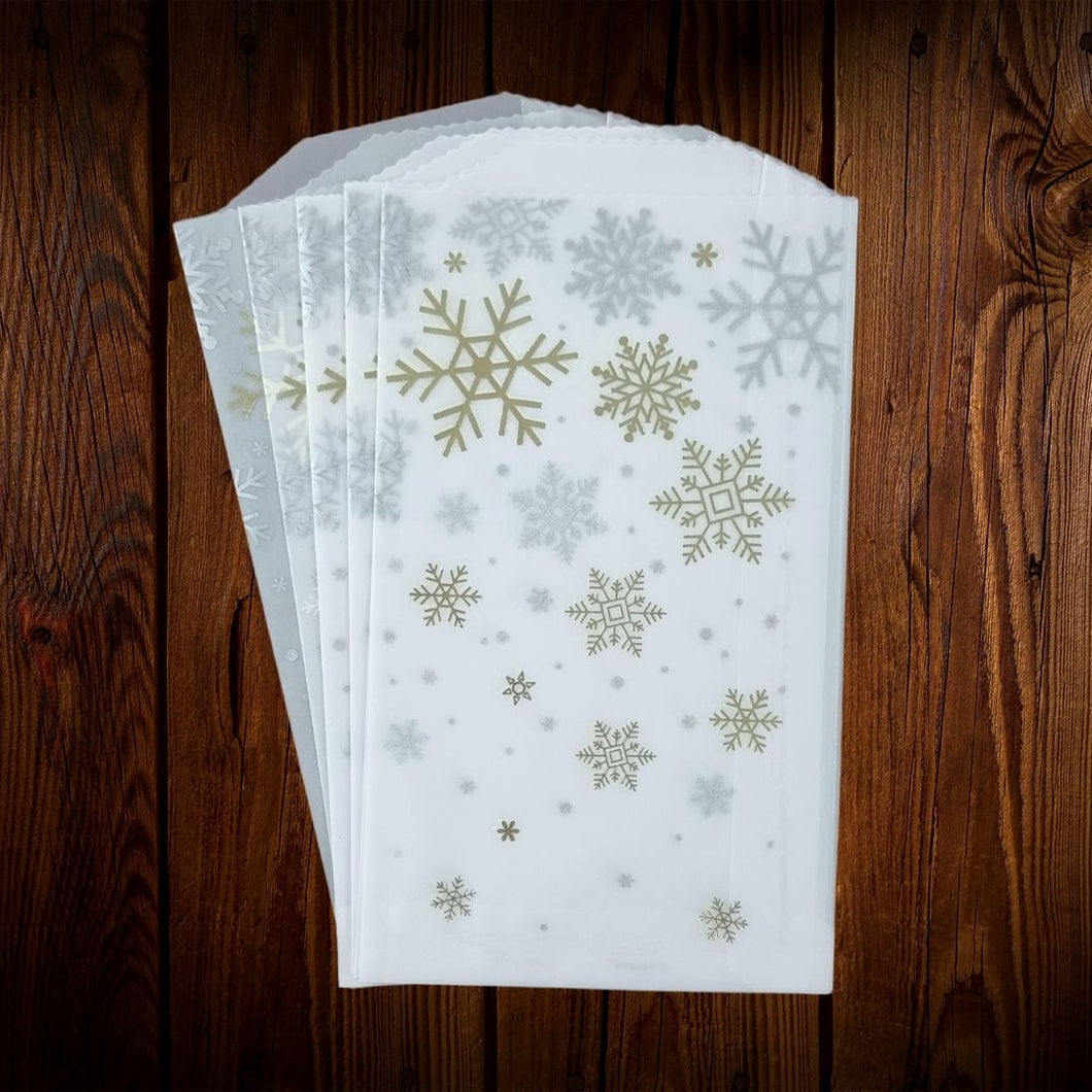 Copos de Nieve. Dorado y plateado. Portacubiertos de papel. 8 Unid. ULTIMO PAQUETE